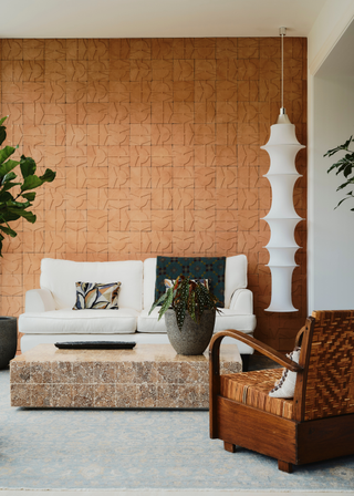 Terracotta textured wall in orangery space