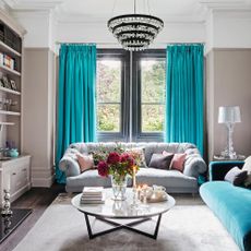 living room with chandelier 