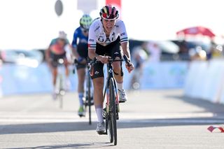 JEBEL HAFEET UNITED ARAB EMIRATES FEBRUARY 10 Silvia Persico of Italy and UAE Team Adq crosses the finish line during the 2nd UAE Tour 2024 Stage 3 a 128km stage from Police Museum Al Ain to Jebel Hafeet 1031m UCIWWT on February 10 2024 in Jebel Hafeet United Arab Emirates Photo by Dario BelingheriGetty Images