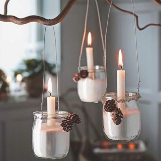 room with hanging pine cone lanterns