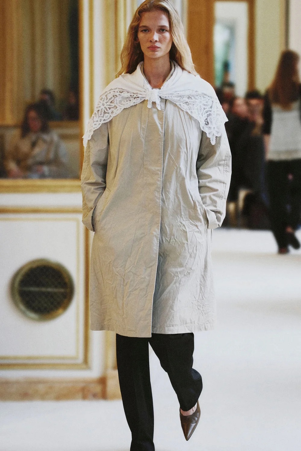 A model walking in The Row's Summer 2027 show during Paris Fashion Week.