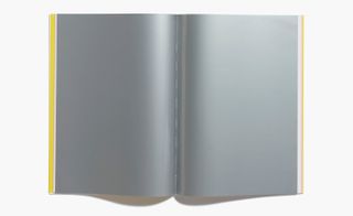 Reflective grey blank pages of book