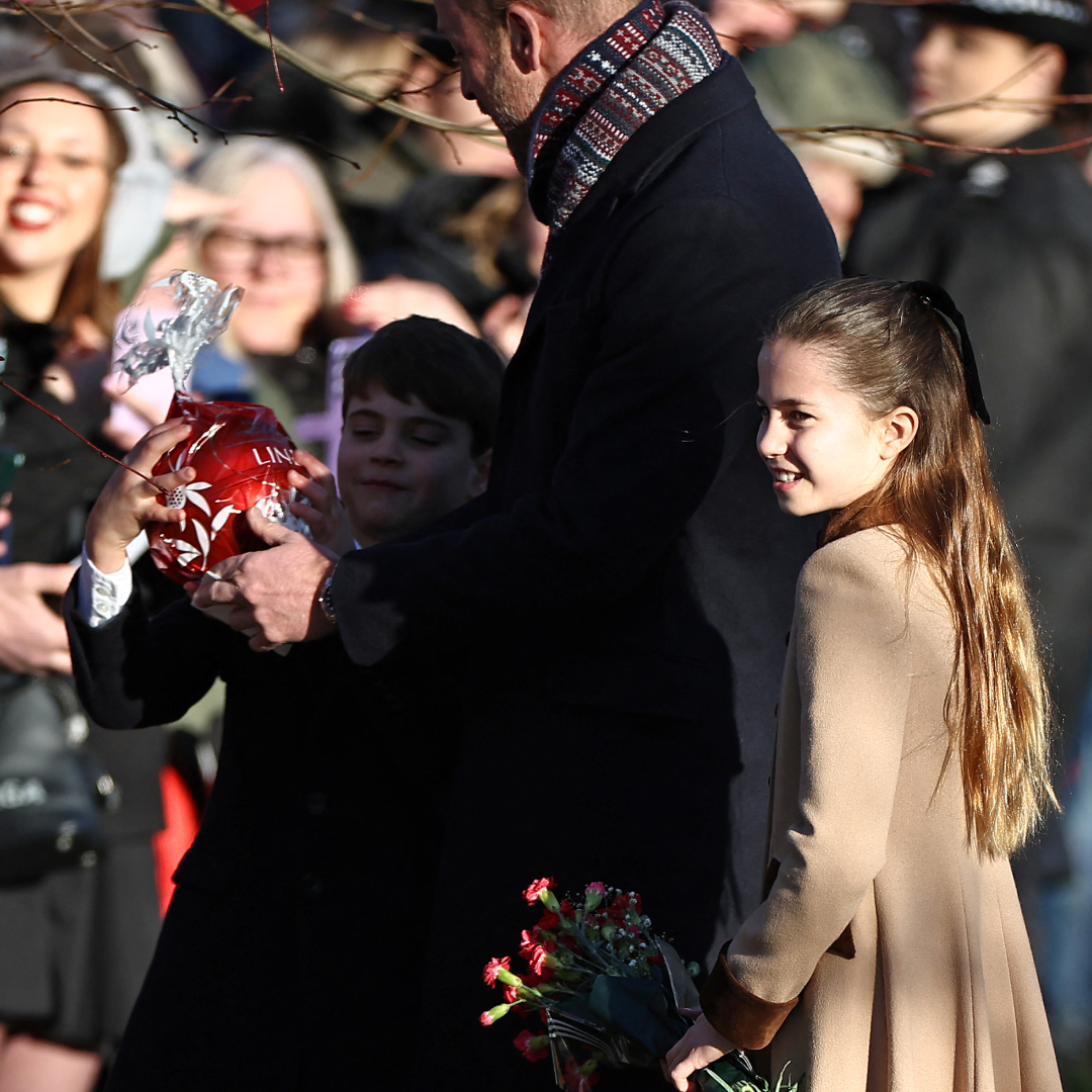 Prince Louis grabs a giant chocolate gift from a fan and his dad runs damage control