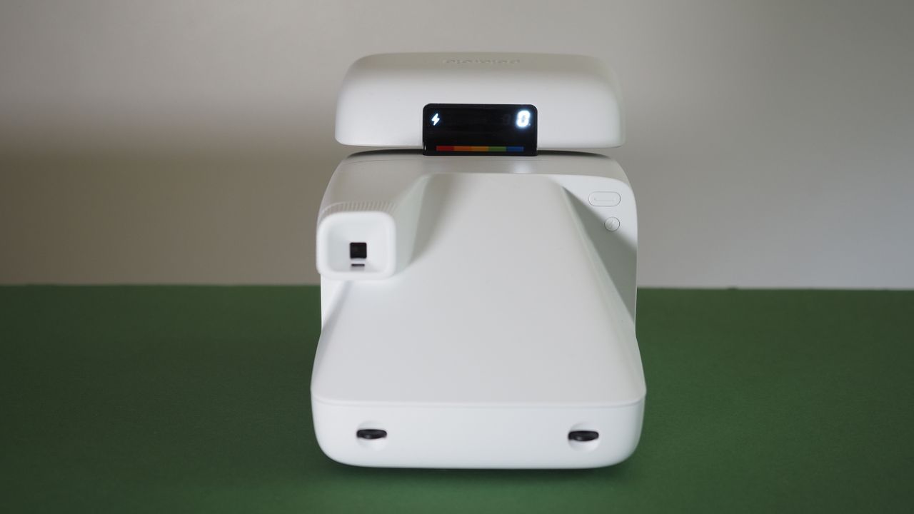 Polaroid Flip camera on a green surface