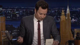 Jimmy Fallon writing out a Thank You note on The Tonight Show