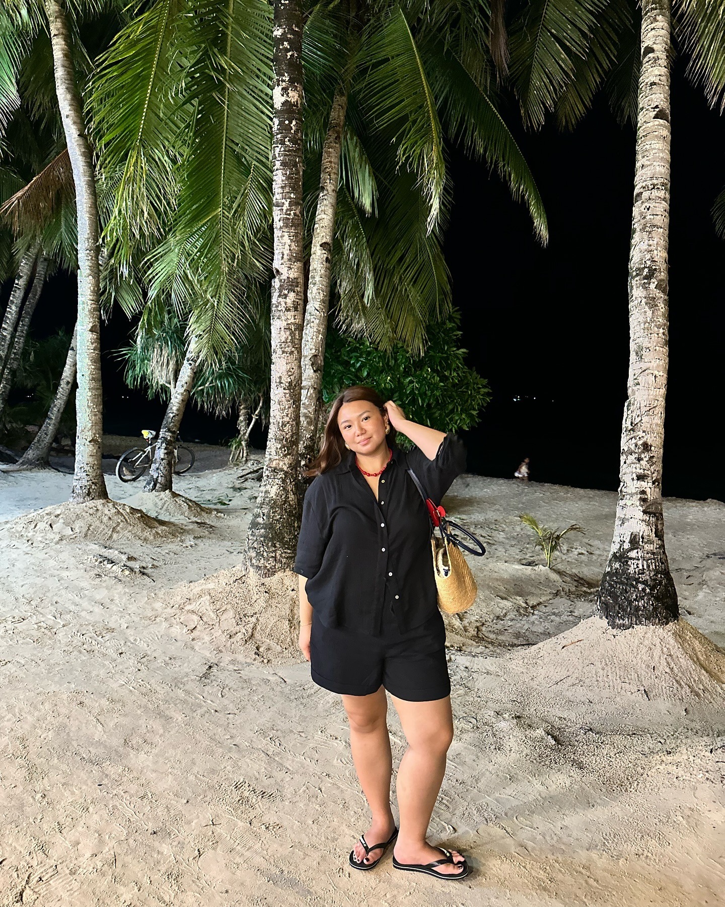 Marina Torres wears black summer shorts.