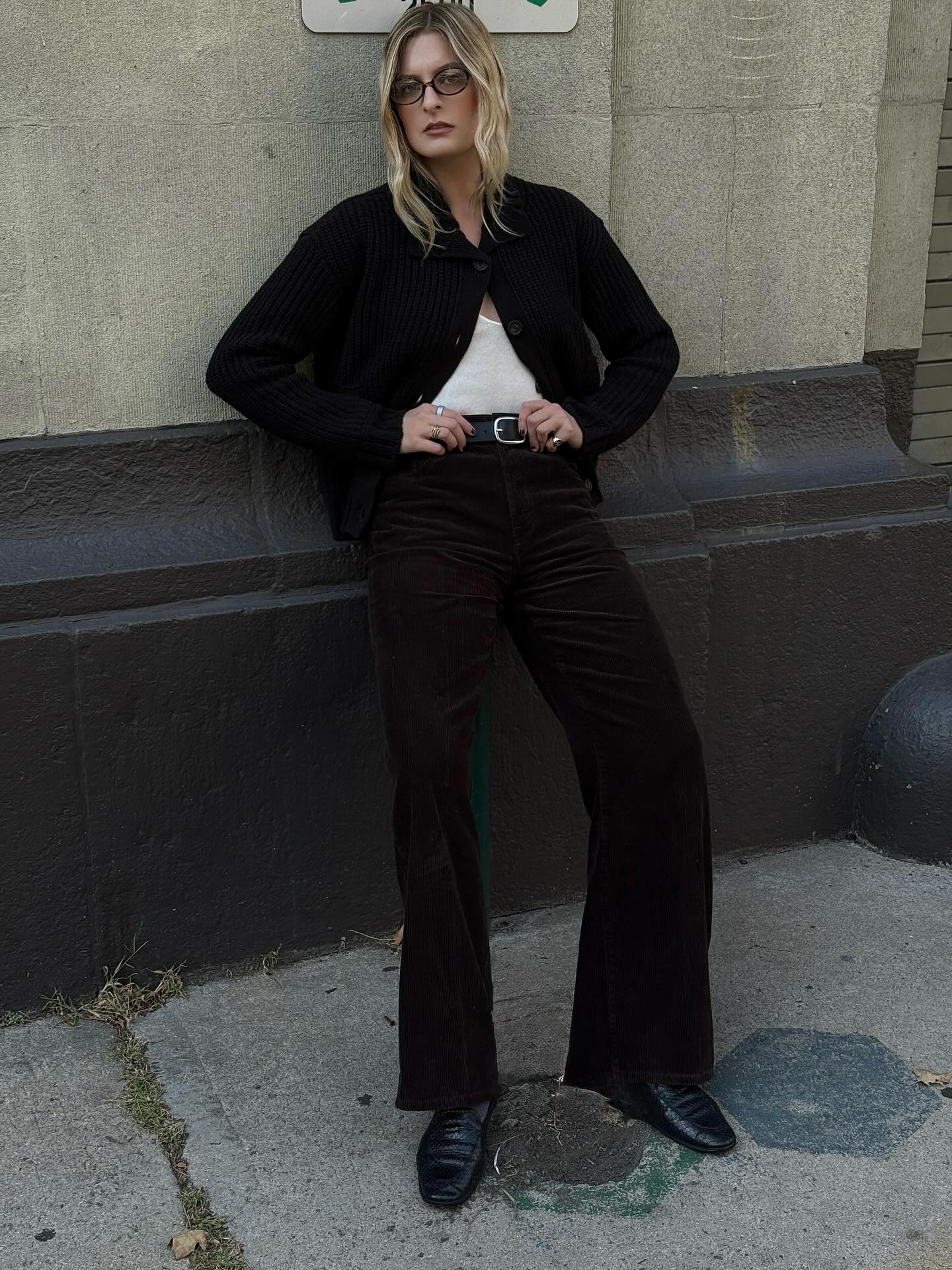 Woman wearing fall outfit with loafers.