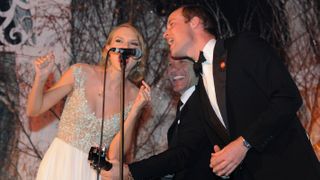 Taylor Swift, Jon Bon Jovi and Prince William, perform during the Winter Whites Gala In Aid Of Centrepoint on November 26, 2013