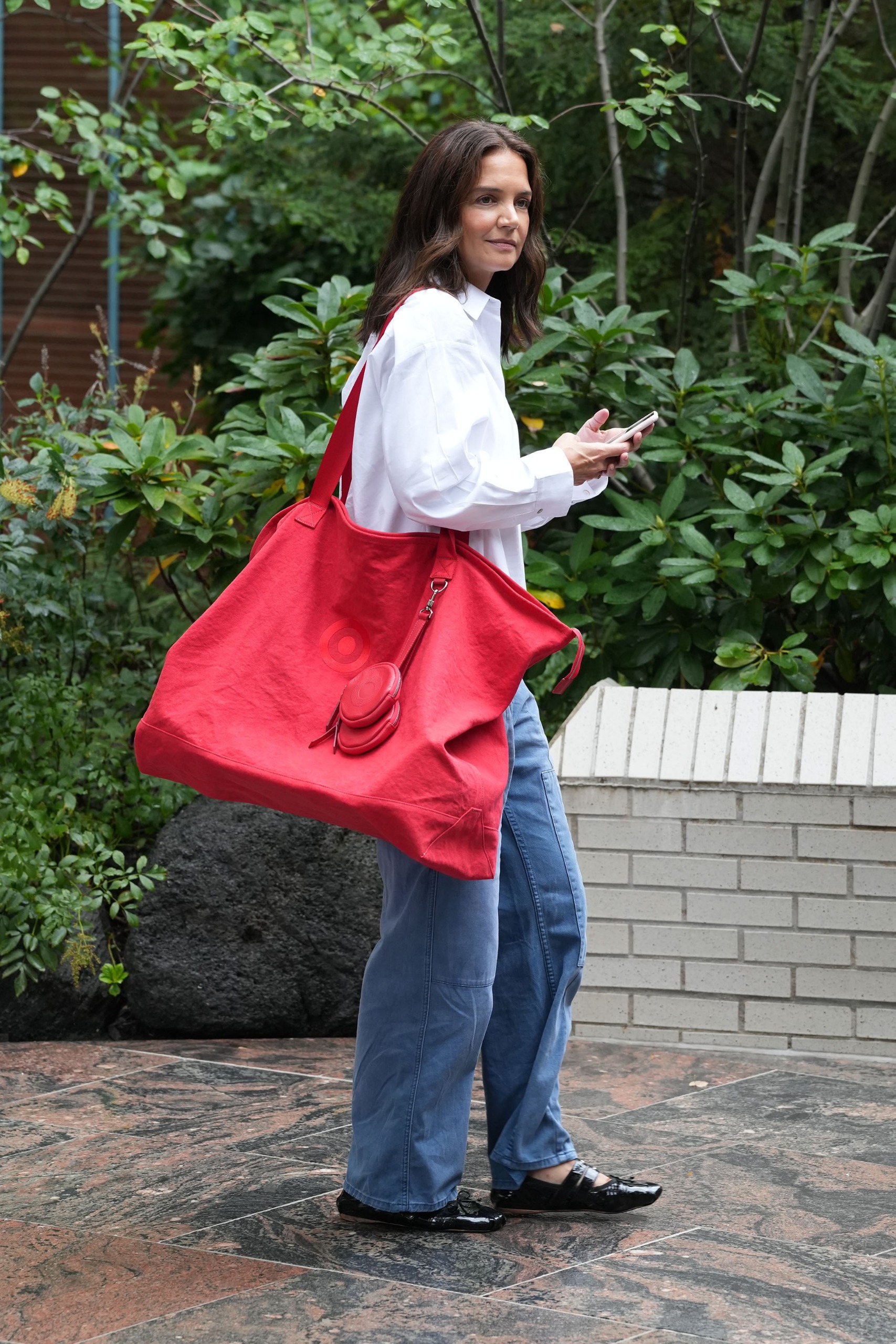 Katie Holmes teased Target's upcoming bag collaboration before New York Fashion Week.