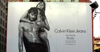 Eva Mendes and model Jamie Dornan are seen on a billboard for the Autumn 2009 Calvin Klein Collection in New York, USA