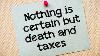 picture of a note saying "nothing is certain but death and taxes"