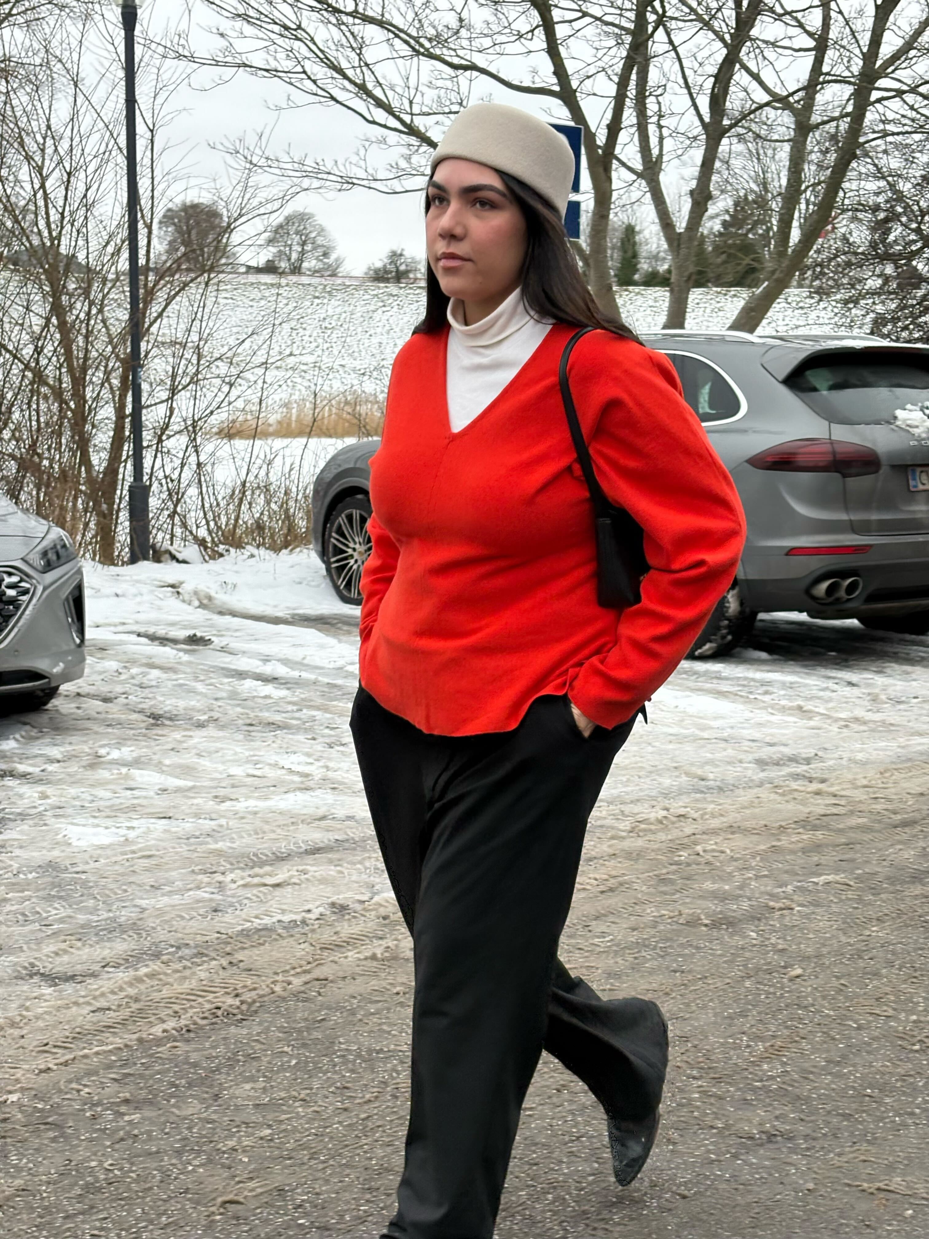 Who What Wear editor Ana Escalante wears a pillbox hat.