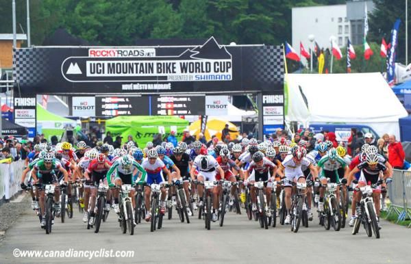 Alexander Gehbauer (center, #1) starts to have chainsuck problems 20 metres into the race