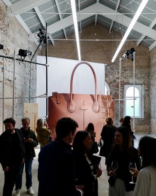 An oversized Tod’s handbag in installation
