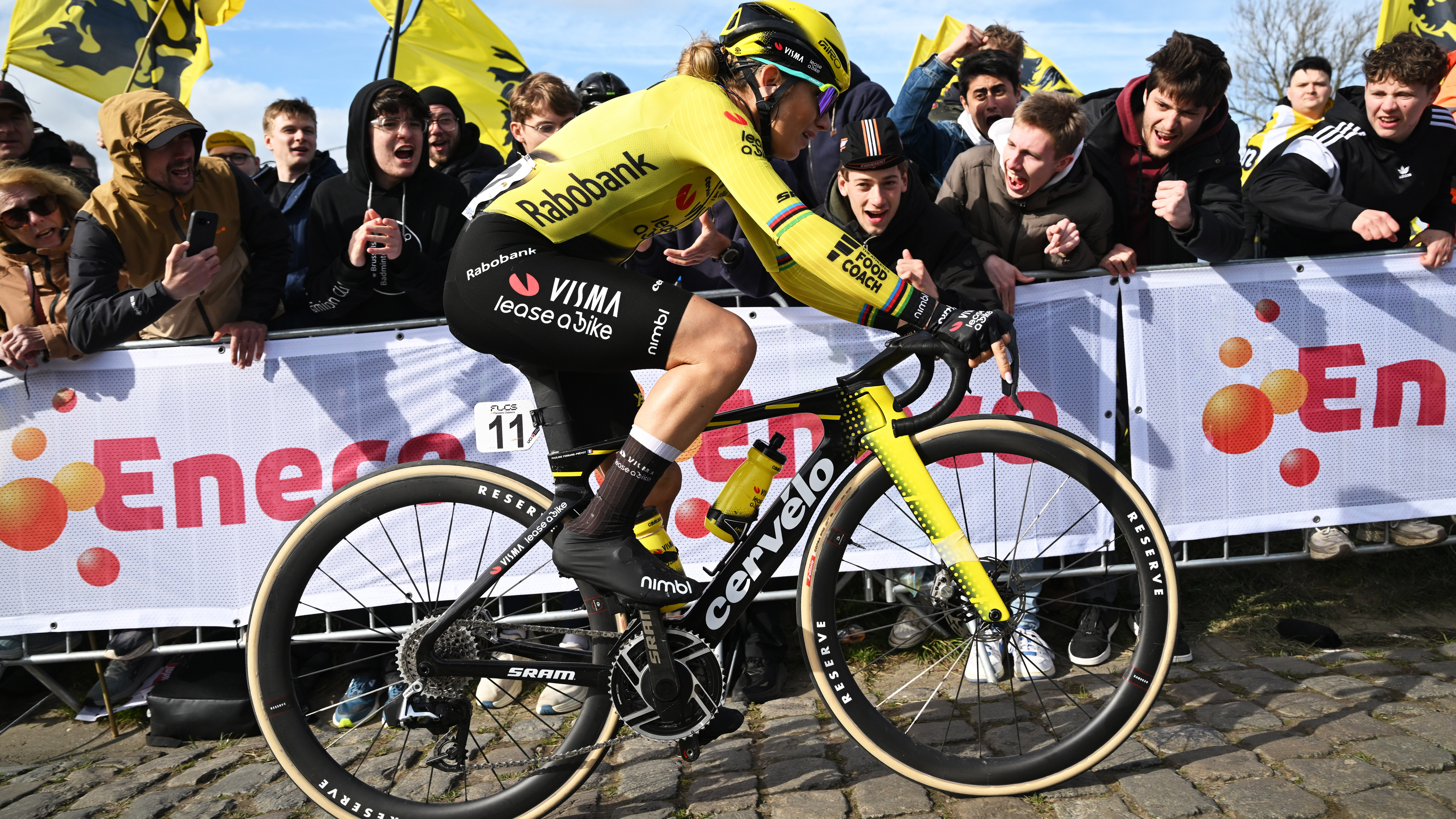 Pauline Ferrand-Prevot of France and Team Visma | Lease a Bike competes passing through the Paterberg cobblestones sector while fans cheer during the 23rd Tour of Flanders 2026