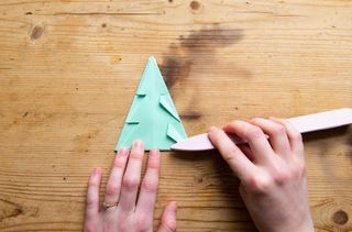 A picture showing how to make an origami Christmas tree at home