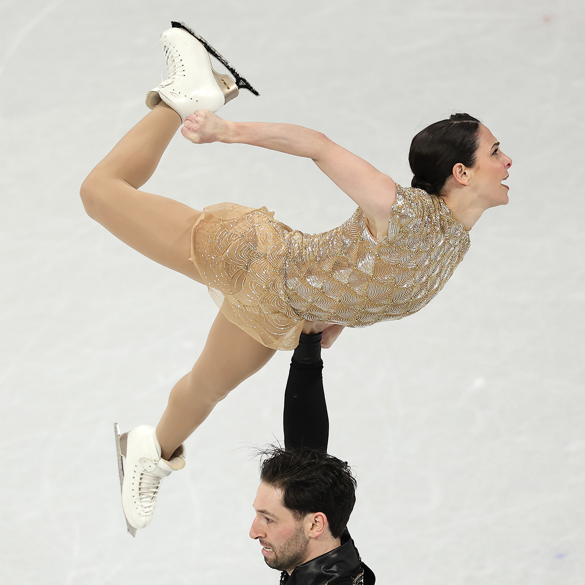 MILAN, ITALY - FEBRUARY 15: Deanna Stellato-Dudek and partner Maxime Deschamps of Team Canada compete in Pair Skating - Short Program on day nine of the Milano Cortina 2026 Winter Olympic games at Milano Ice Skating Arena on February 15, 2026 in Milan, Italy. 