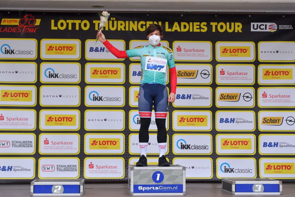 GERA GERMANY MAY 26 Kathrin Hammes of Germany and Ceratizit WNT Pro Cycling Team green mountain jersey celebrates at podium during the 34th Internationale LOTTO Thringen Ladies Tour 2021 Stage 2 a 1251km stage from Gera to Gera Mask Covid safety measures ltlt2021 lottothueringenladiestour womencycling on May 26 2021 in Gera Germany Photo by Luc ClaessenGetty Images