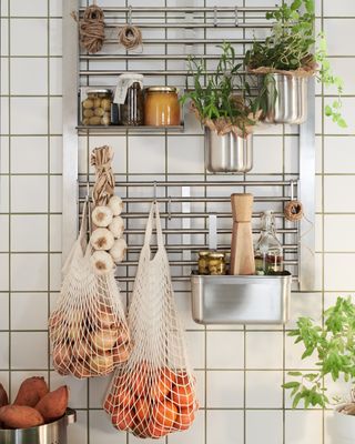 Kitchen vertical gardening with herb planters