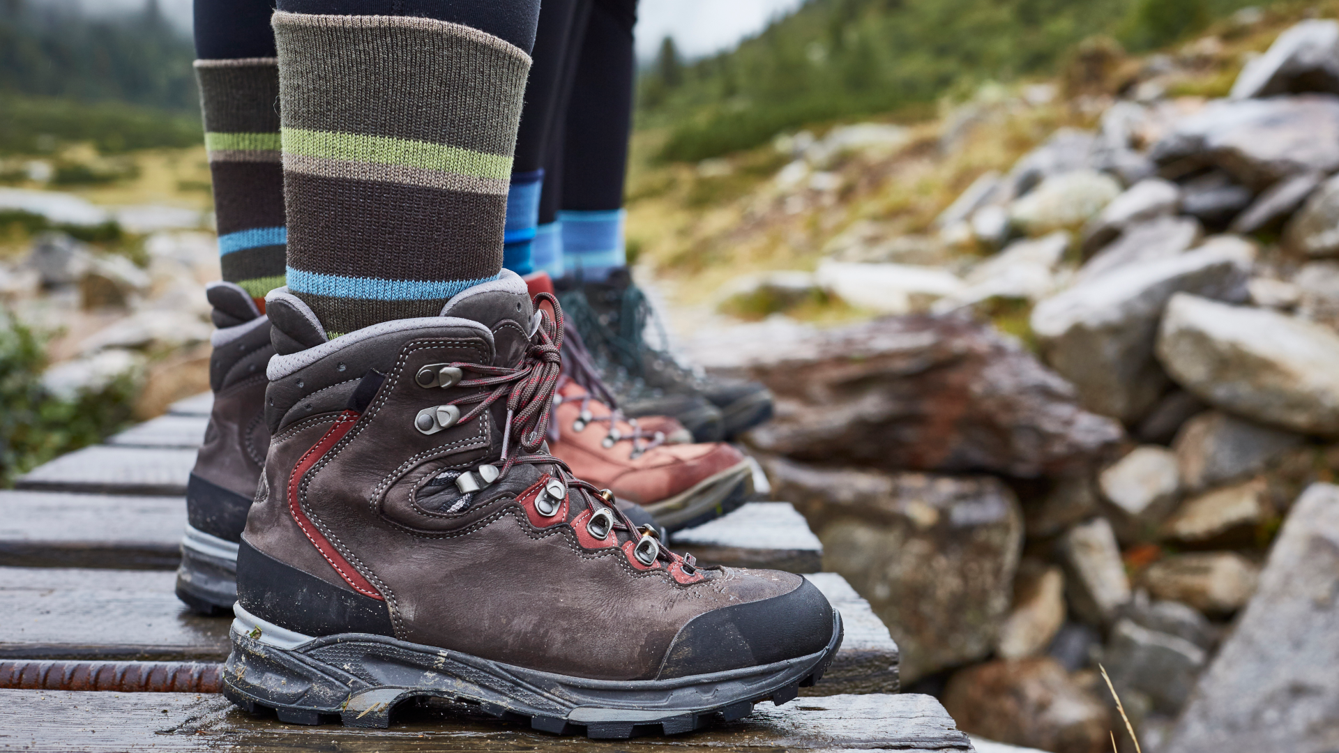 close up of hiking boots on a little wooden bridge