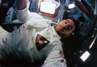 Apollo 8 lunar module pilot Bill Anders is seen inside the command module during the historic voyage around the moon in December 1968.