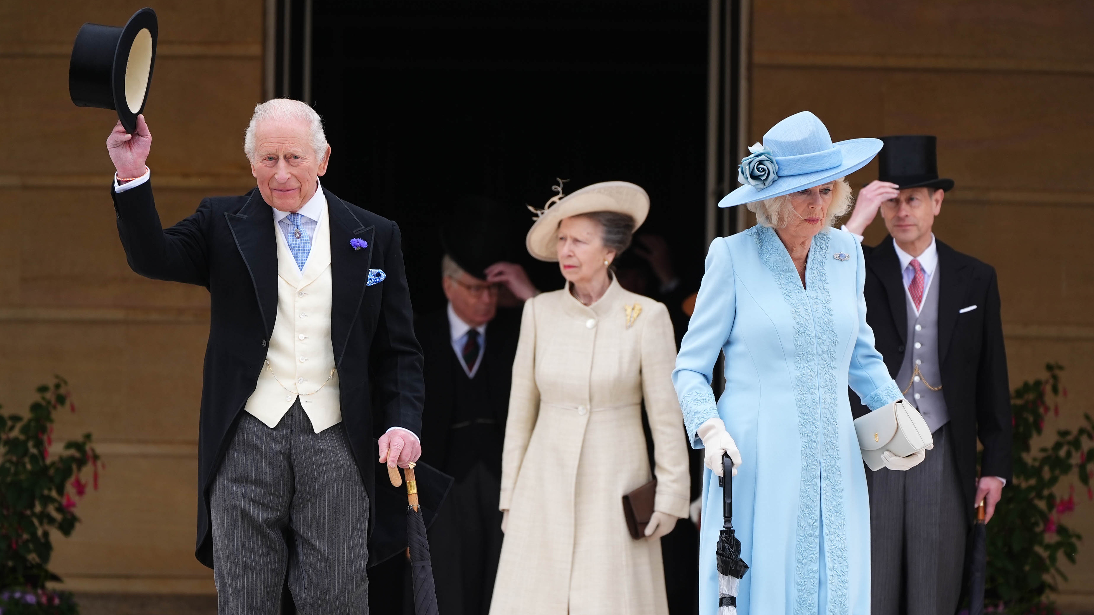 King Charles III, Princess Anne, Queen Camilla and Prince Edward, Duke of Edinburgh stand at the top of the Garden steps before the start of a Royal Garden Party at Buckingham Palace on May 6, 2026