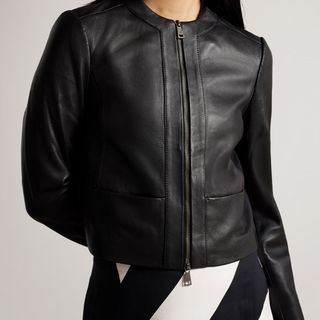 model wearing a ted baker panelled leather jacket with two zips