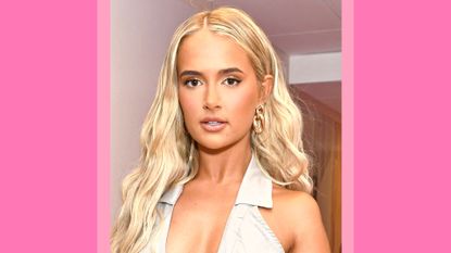 Molly-Mae Hague wears a cream jumpsuit as she attends the launch party of Molly Mae's Pretty Little Thing collection at Novikov on August 26, 2021 in London, England. In a pink template