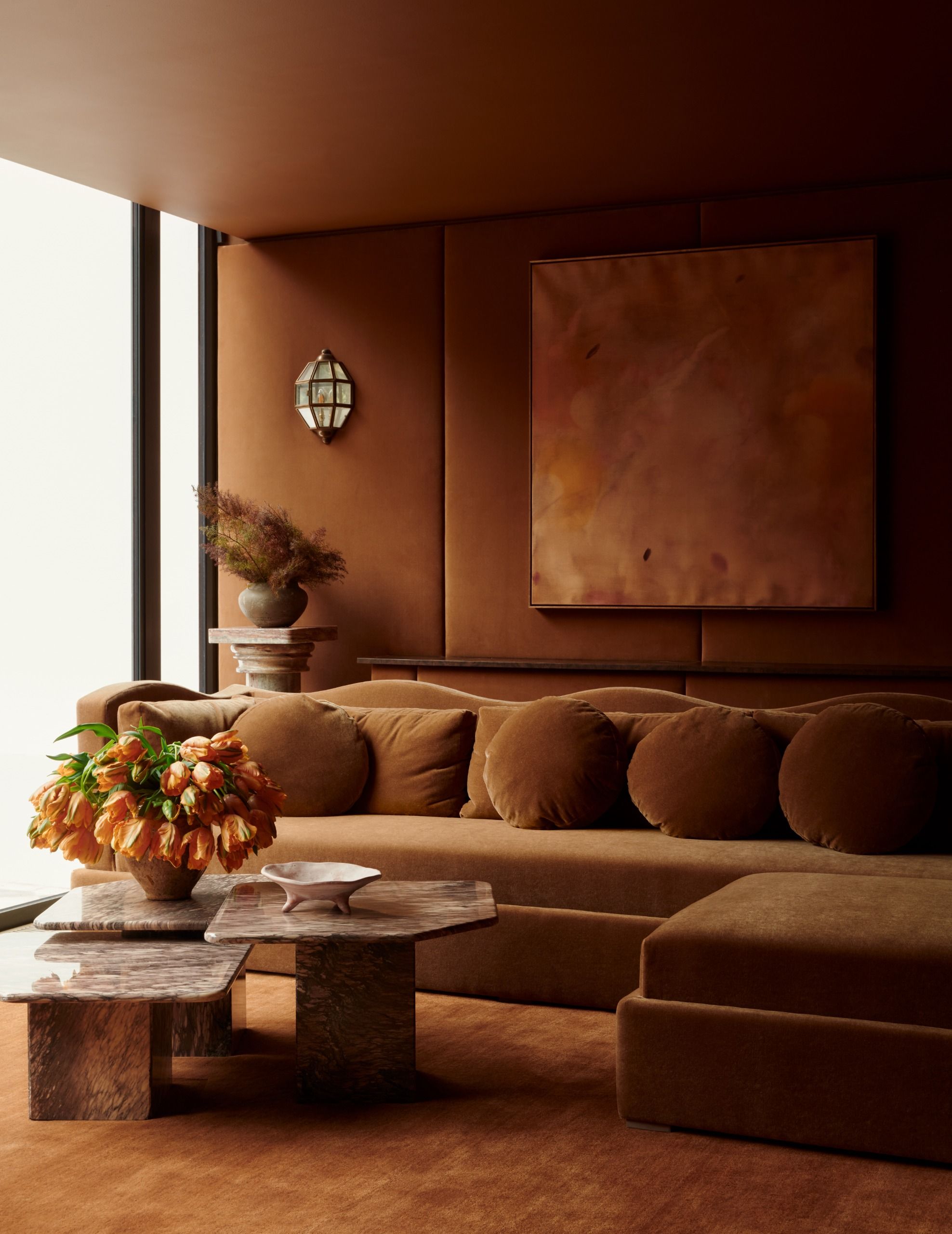 a room in shades of terracotta with different textures