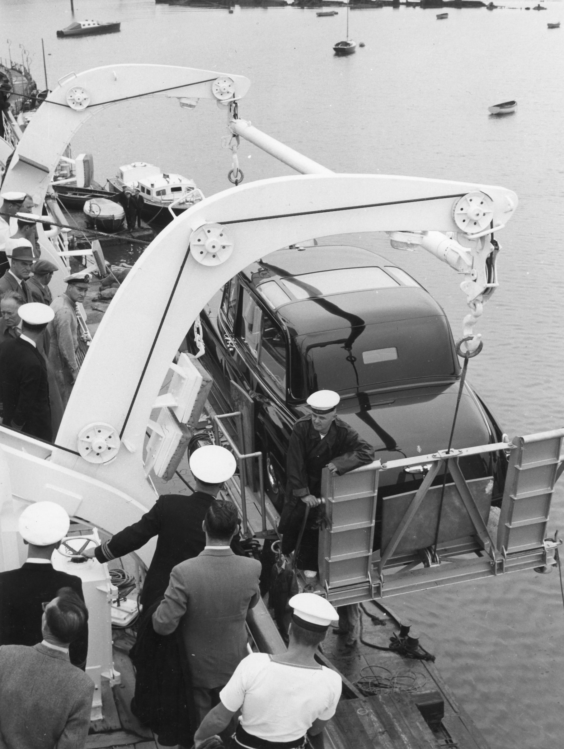 The Royal Rolls-Royce is towed aboard Britannia via a lift