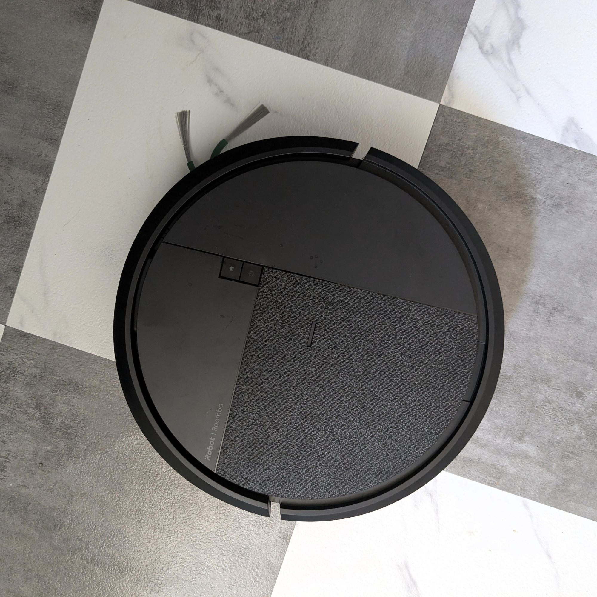 iRobot Roomba Plus 415 Combo cleaning black and white tiled floor