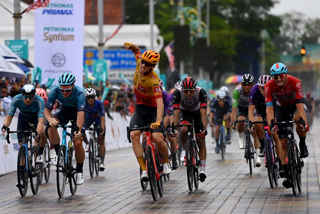 Erlend Blikra (Uno-X Pro Cycling) celebrates at finish line as stage 6 winner ahead of Gleb Syritsa (Astana Qazaqstan) and Rudiger Selig (Lotto Soudal)