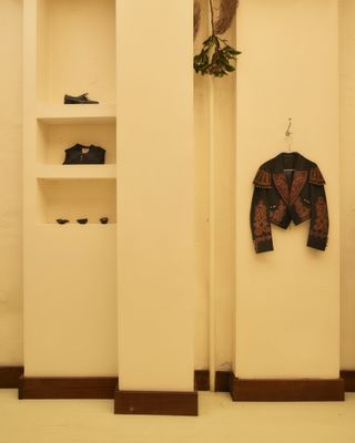Inside of Desert Vintage store with garment hanging on wall