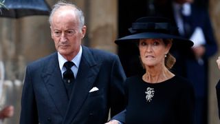 Norton Knatchbull, Earl Mountbatten of Burma accompanied by his wife Penny, Countess Mountbatten of Burma attends the funeral of his mother Patricia Knatchbull