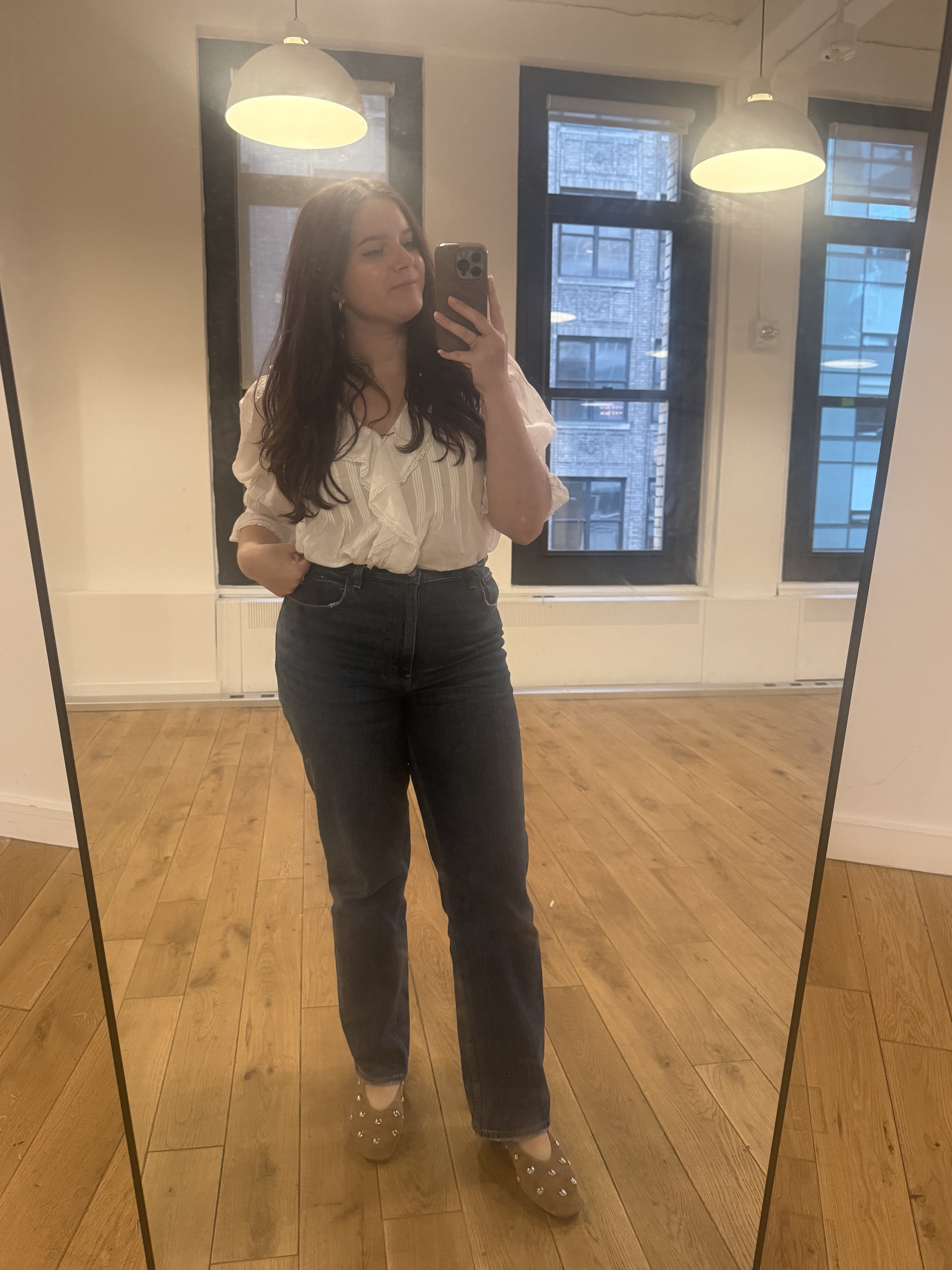 Brooke Knappenberger poses in mirror wearing madewell mylie ballet flats