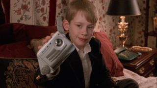 Kevin holding a Talkboy in Home Alone 2: Lost In New York