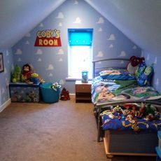 toy story bedroom with bed with cushions toys