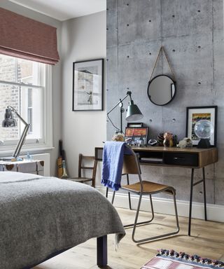 A teenage boys bedroom idea with modern desk and chair again mottled grey chimney breast