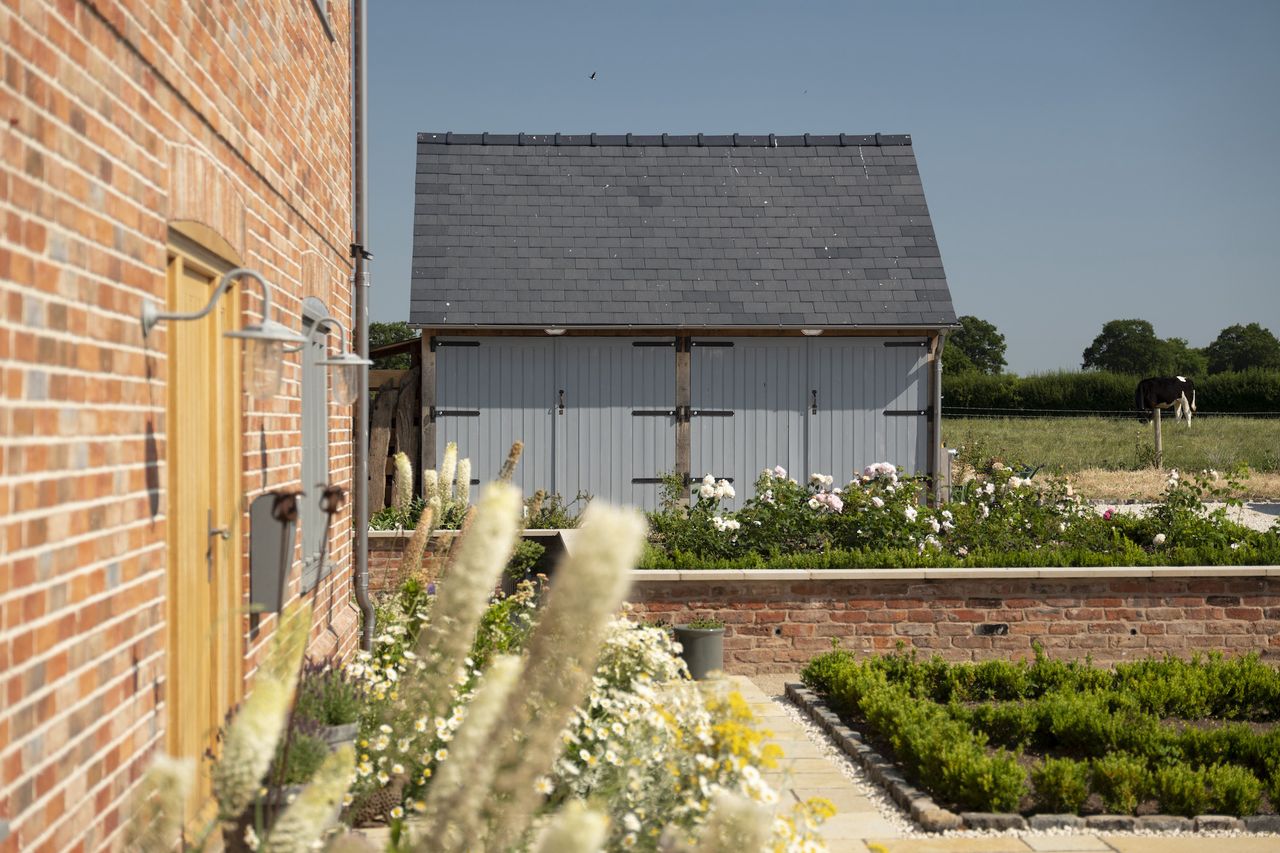 country cottage garden with potting shed