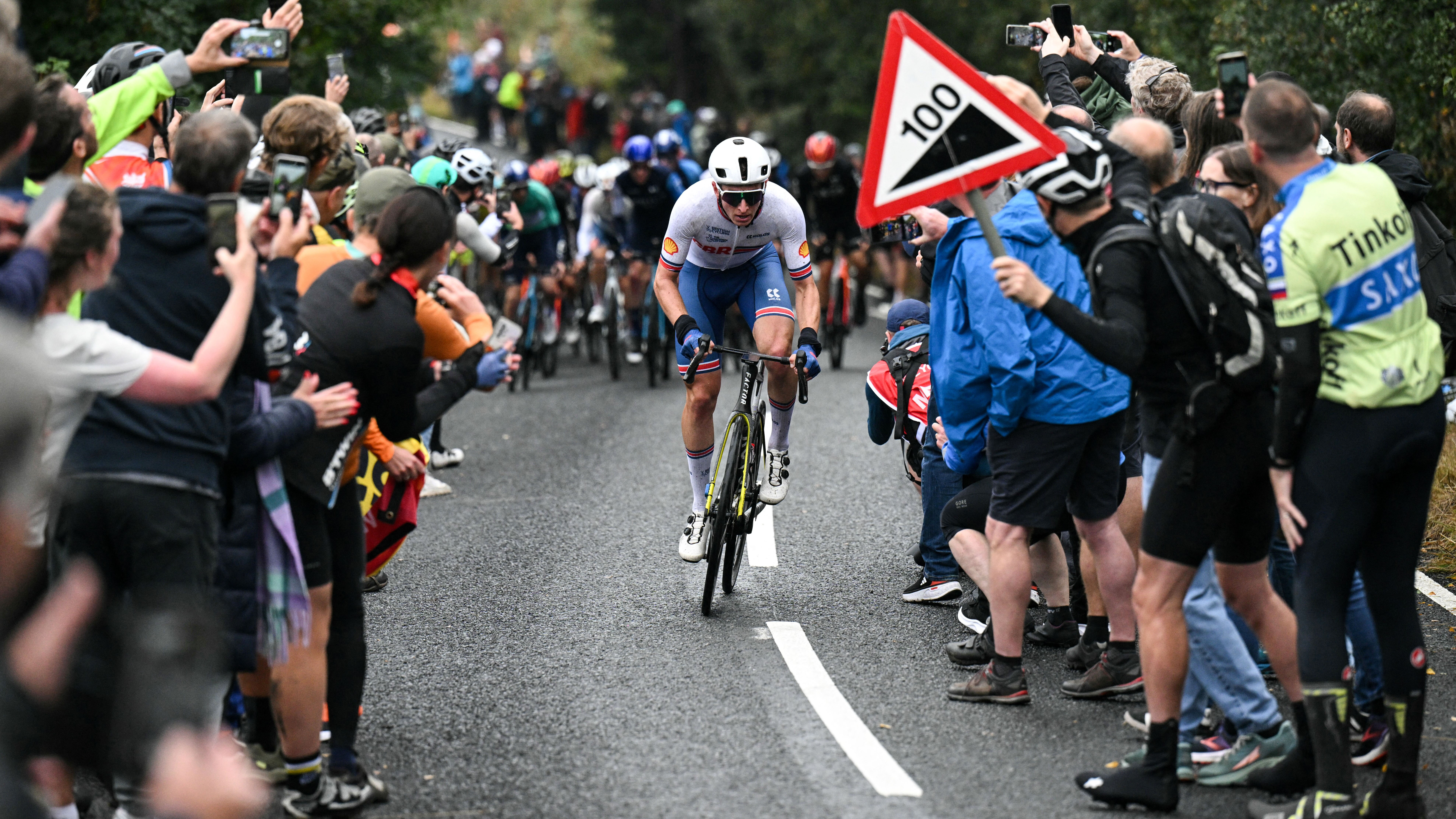 Britain's Matt Holmes of the team Great Britain competes as he cycles over "Jawbone Hill" during the third stage from Sheffield to Barnsley of the Tour of Britain cycling race, near Oughtibridge, northern England, on September 5, 2024. (Photo by Oli SCARFF / AFP) (Photo by OLI SCARFF/AFP via Getty Images)