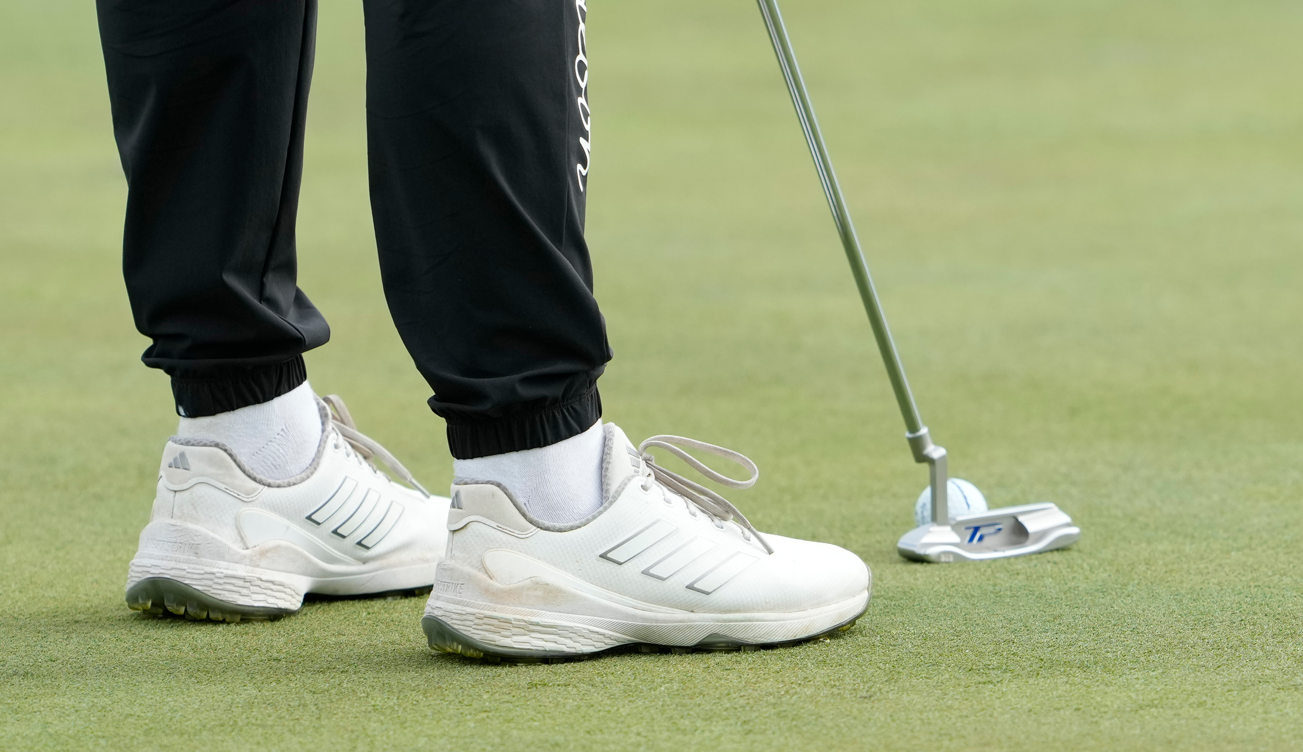 Charley Hull stands over a putt