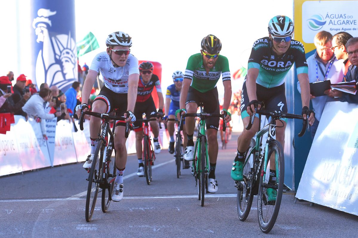Sam Oomen (Team Sunweb) crosses the line to keep the white jersey