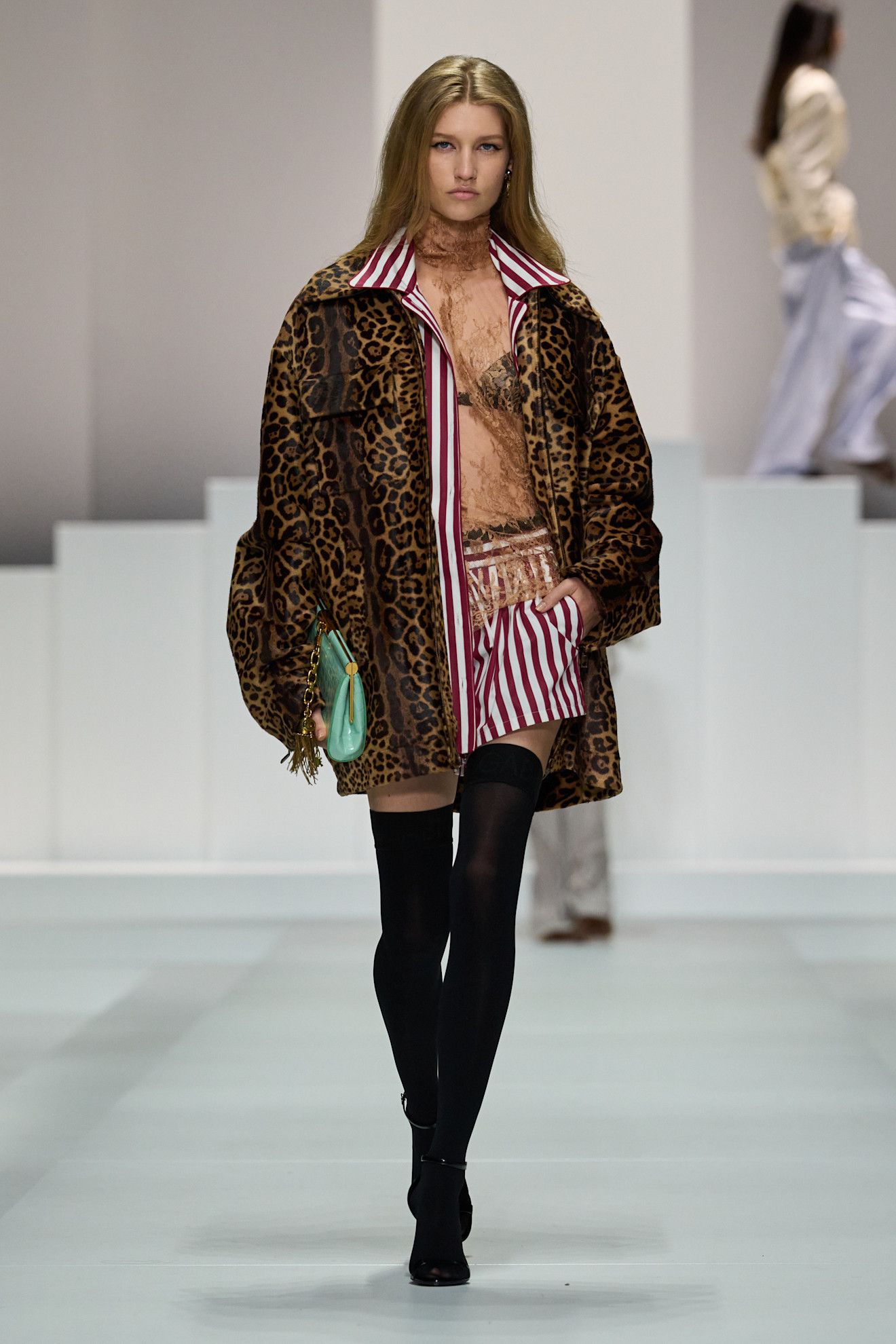 A model walks the runway from dolce & Gabbana spring/summer 2026