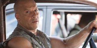 Vin Diesel as Dominic Toretto driving in Fast and Furious