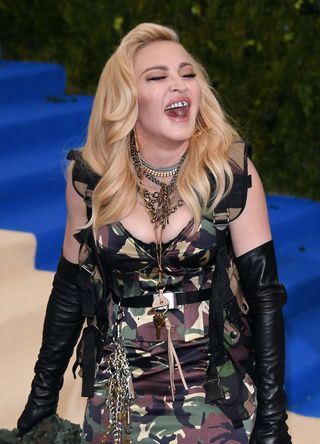 Madonna flashing her dental grills at the Met Gala