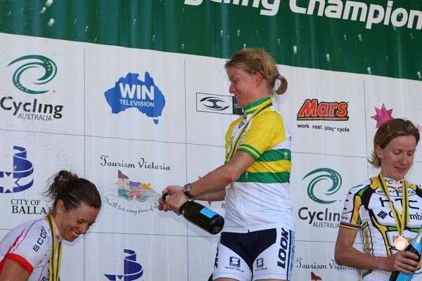 Ruth Corset (Team Tibco) soaks Bridie O'Donnell (VIC) with sparkling wine after the podium presentations