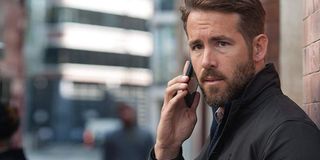 Ryan Reynolds with full facial hair in The Hitman's Bodyguard.