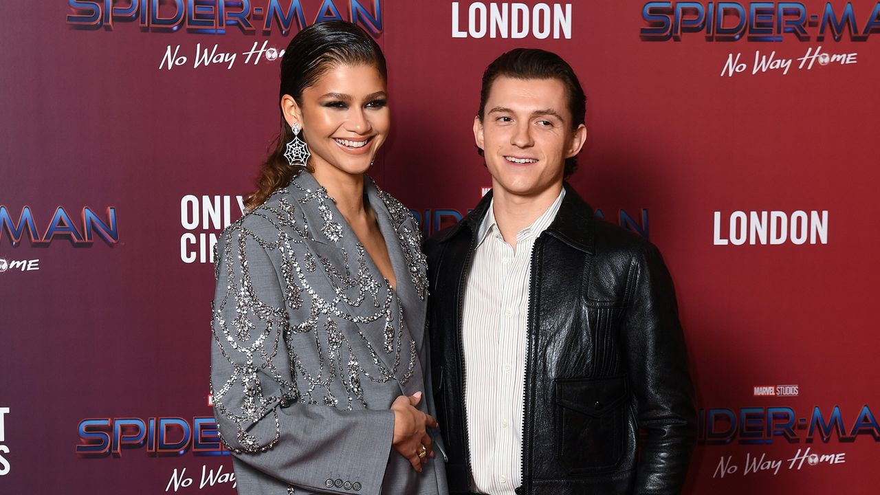 Zendaya and Tom Holland attend a photocall for &#039;Spiderman: No Way Home&#039; at The Old Sessions House on December 05, 2021 in London, England