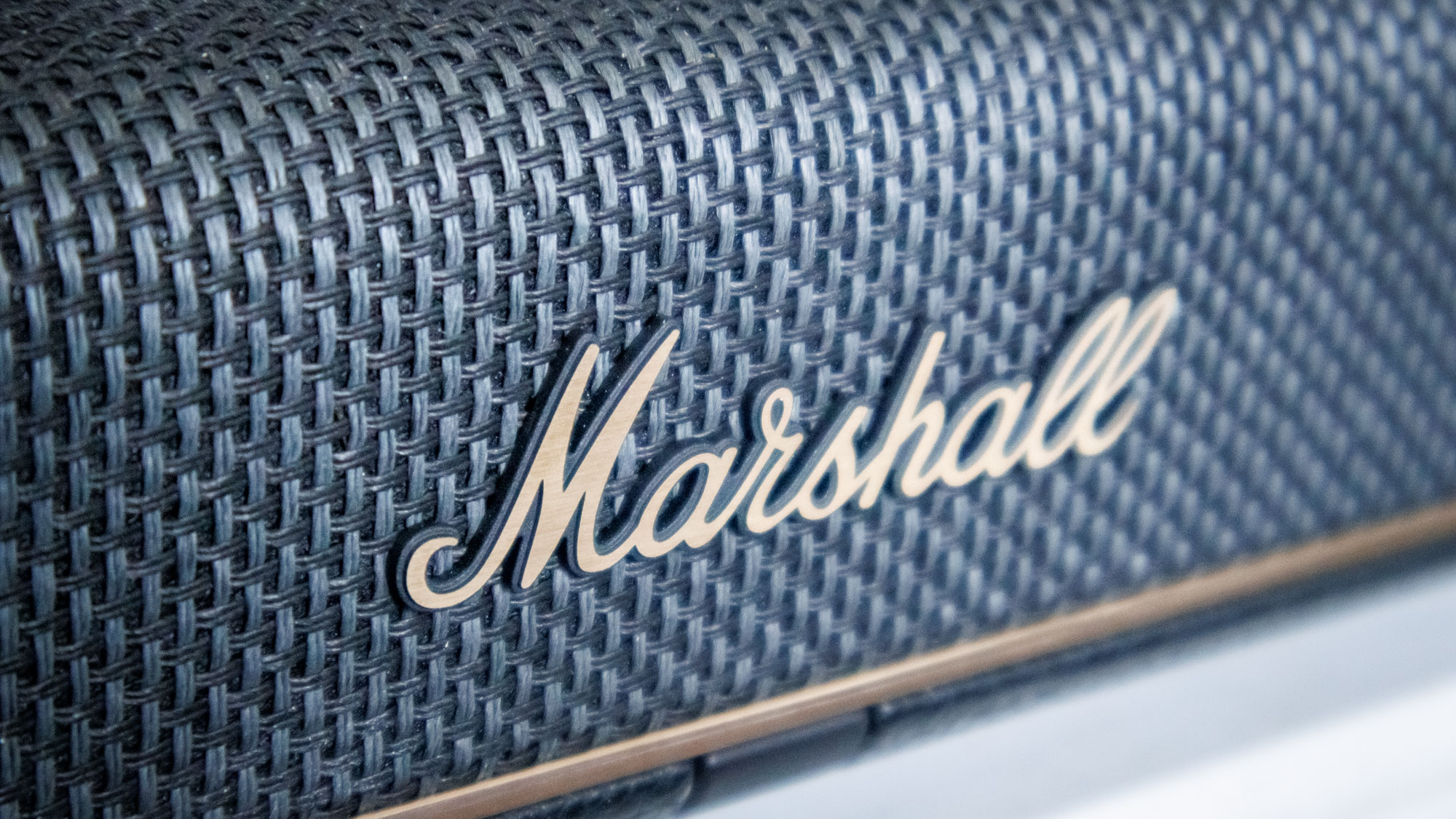 A close-up of the Marshall logo on a Heston 120 soundbar.