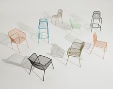 Eight chairs showing the range of garden furniture designed by Benjamin Hubert in pink, blue, green, mint and black